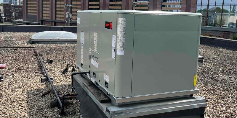 trane commercial unit on a bed of rocks